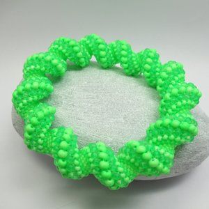 UV reactive Cellini spiral handwoven bangle bracelet